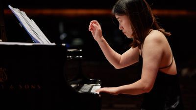 Student playing the piano